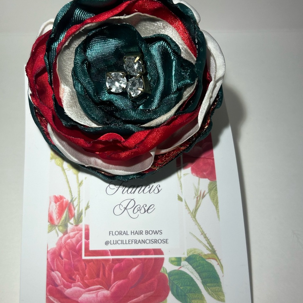 Lucille Francis Rose Handmade Red&Green Floral Hair Bow with removable feathers.